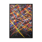 Framed abstract artwork with colorful lines on a white wall