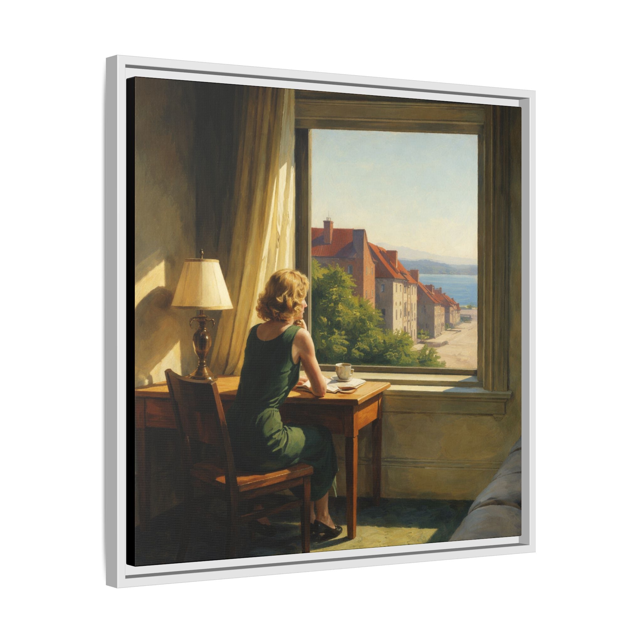 Woman sitting at a desk by a window with a scenic view