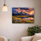 Living room with a large mountain landscape painting on the wall, two beige chairs, a coffee table with items, and a plant.