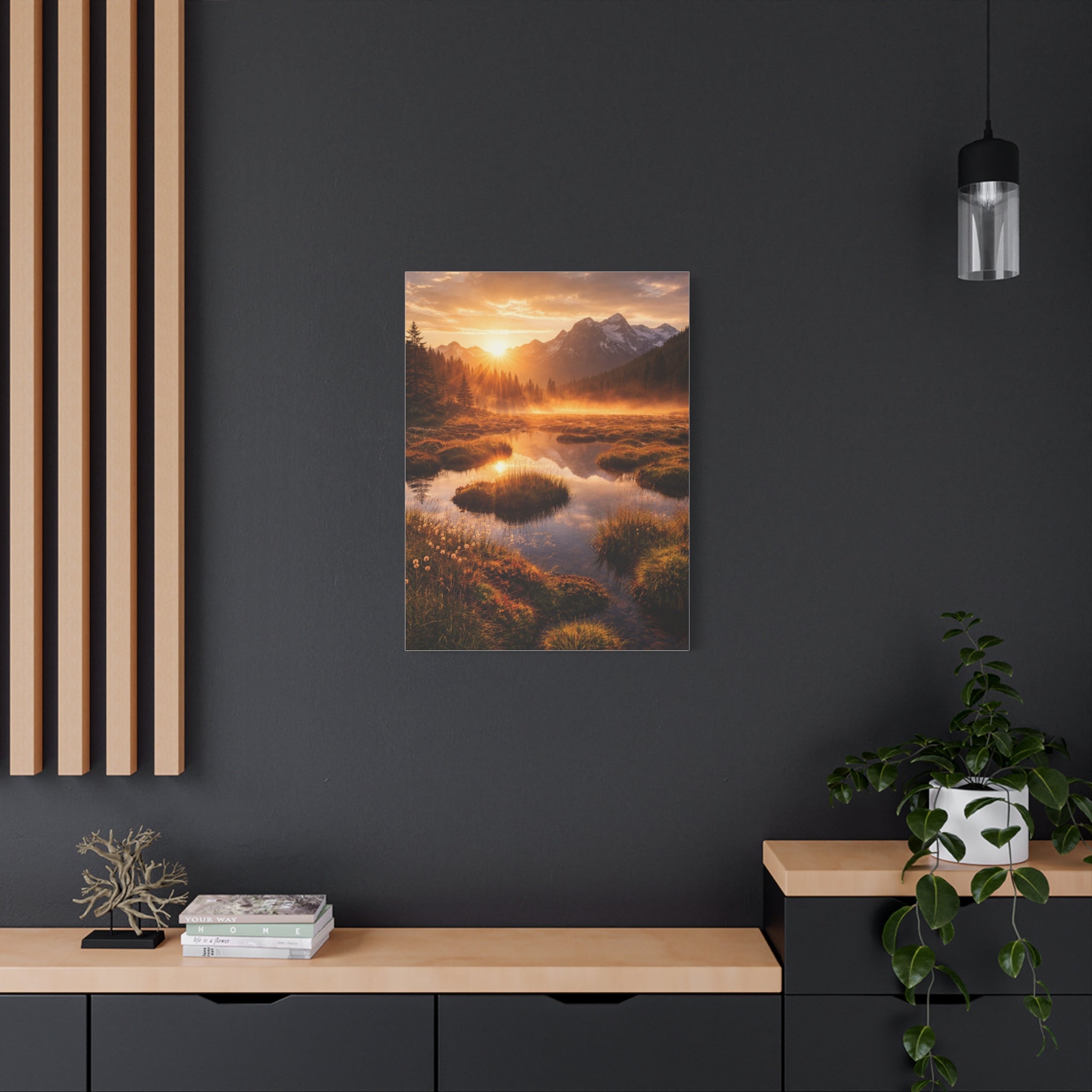 Poster of a mountain landscape with a sunset over a misty valley in a modern interior setting.