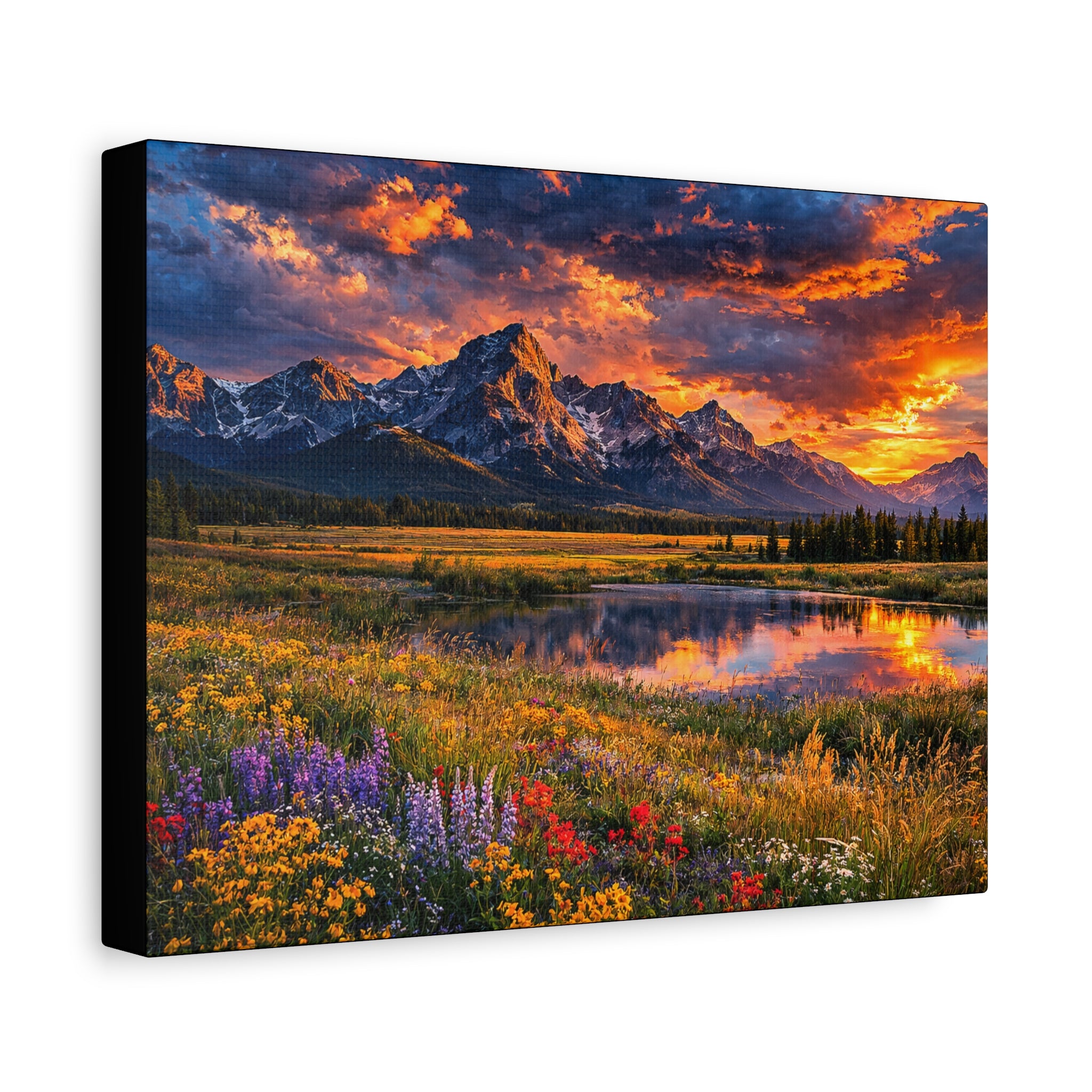 Mountain landscape with a sunset over a lake and colorful flowers in the foreground.