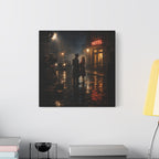 Framed artwork of a couple on a rainy street with a hotel sign, displayed on a wall above a desk.