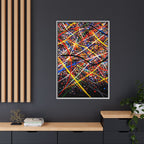 Framed abstract artwork with colorful lines on a dark wall.