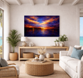 Living room with a large TV displaying a sunset scene, white walls, and decorative elements.